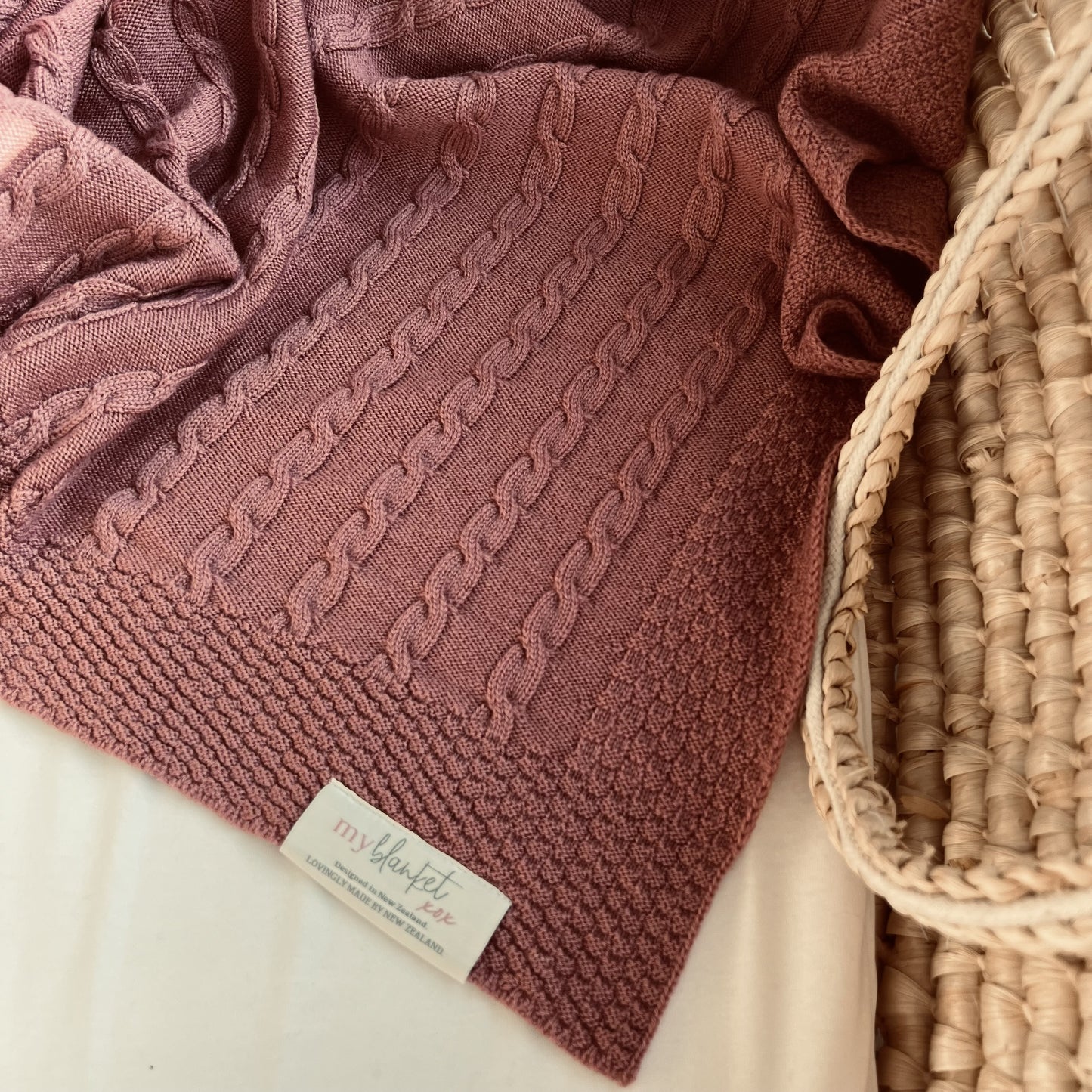 merino cable blanket dusty rose